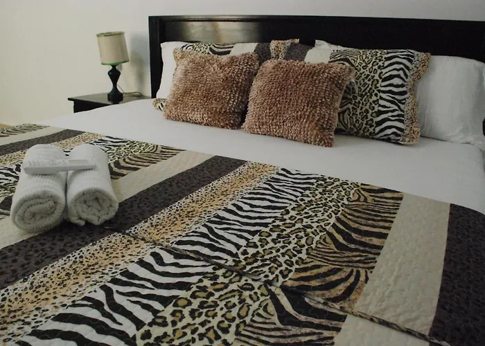 Coastalbay 2 & Golf Cart Hotel *